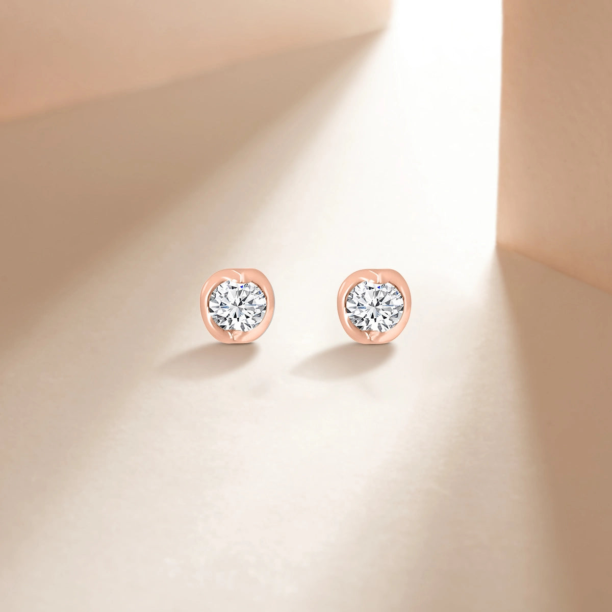 14K Rose 0.50 CTW Round Diamond Tension-Set Stud With Push Back