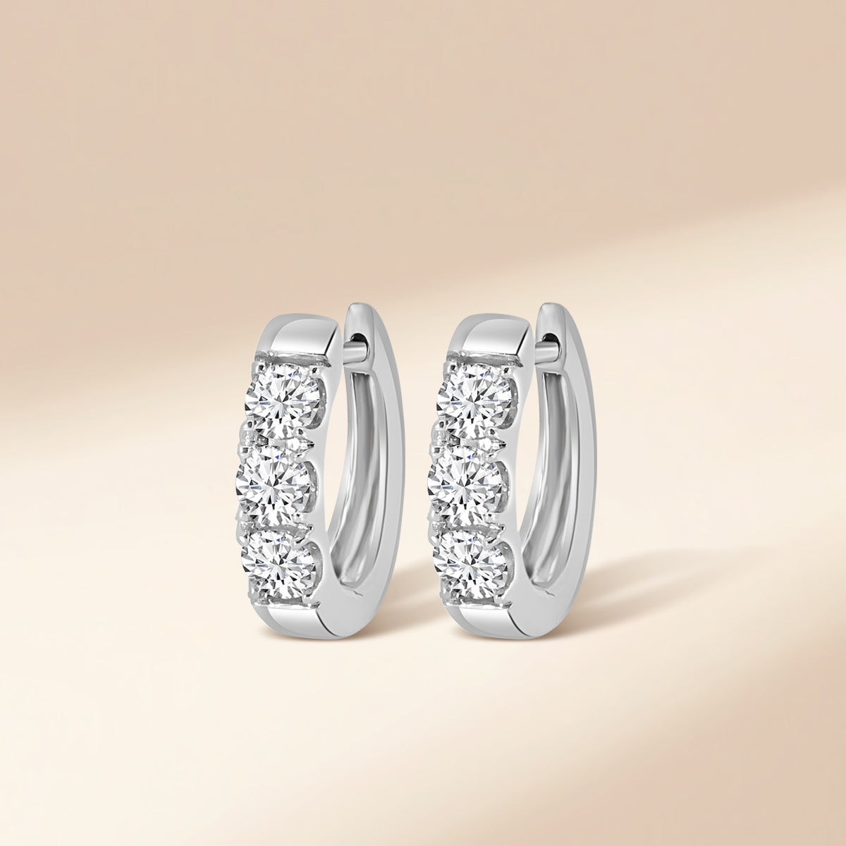 1.00 CTW Diamond Oval Earring Huggies