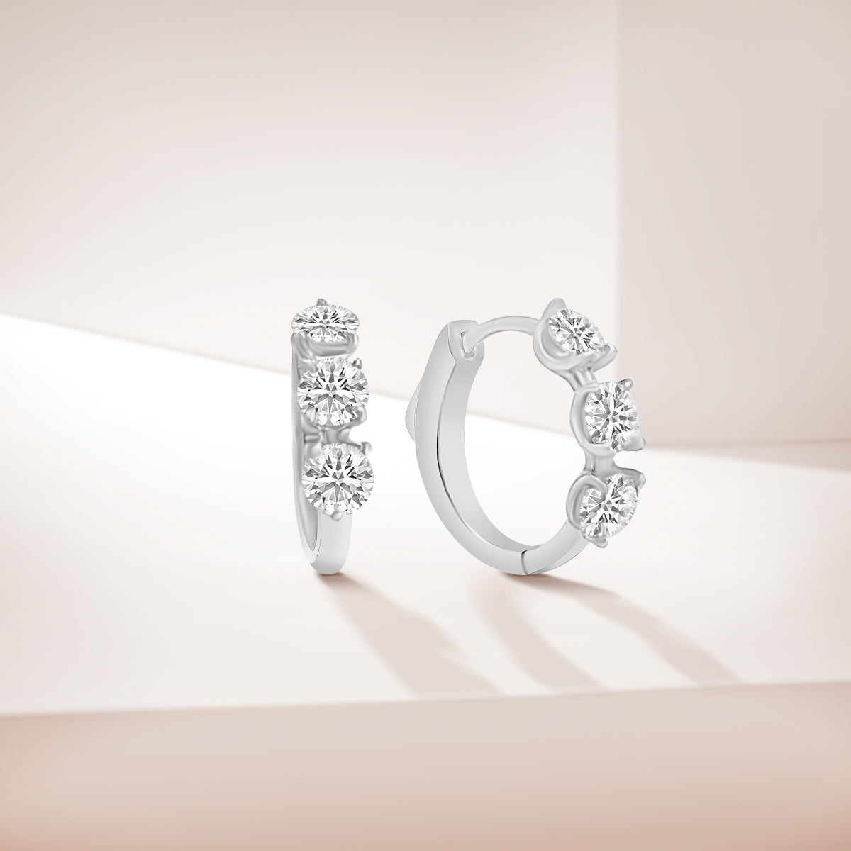 0.50 CTW Diamond Oval Earring Huggies