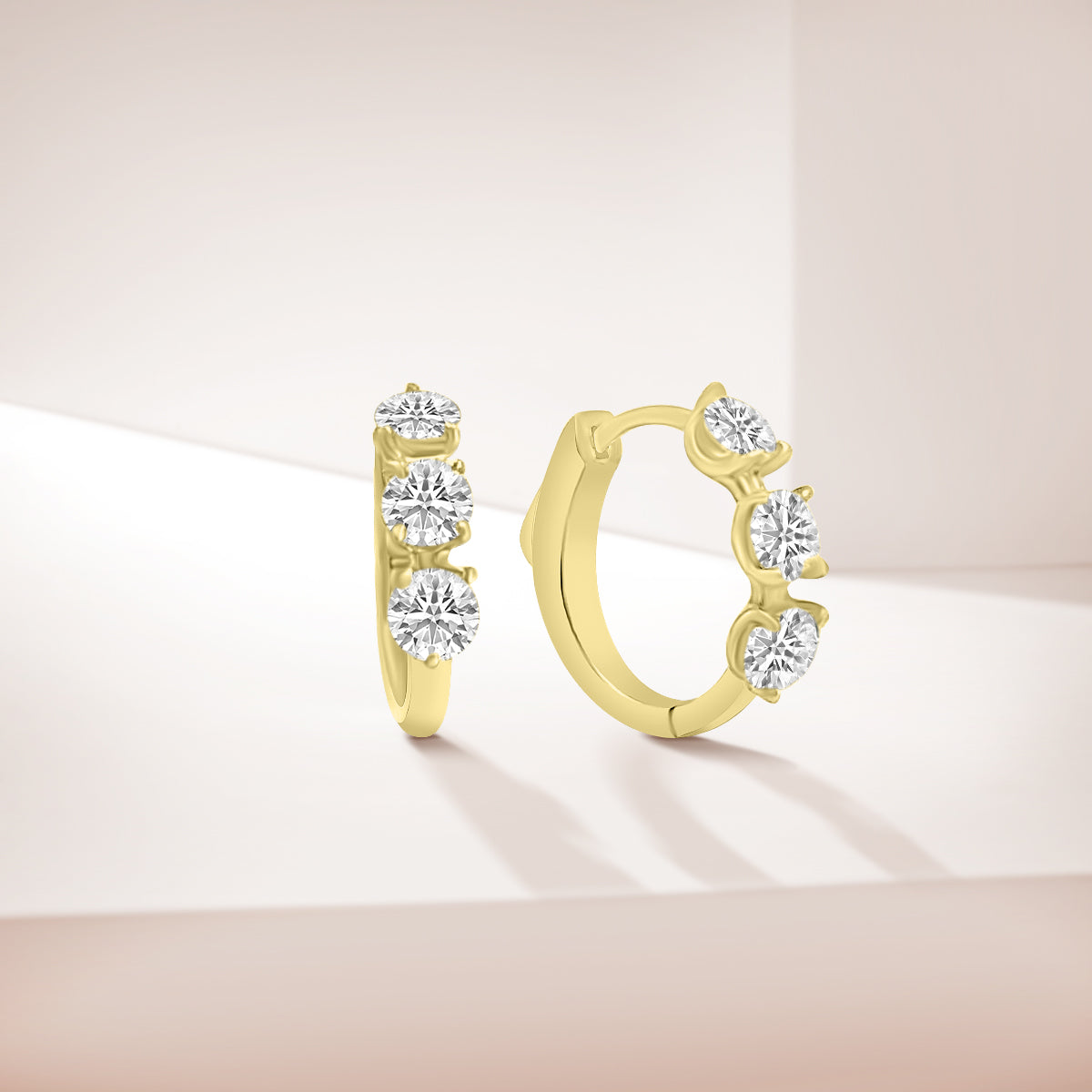 0.50 CTW Diamond Oval Earring Huggies