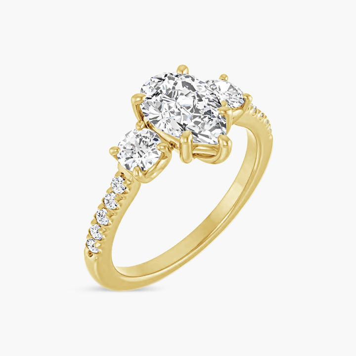 The Three Stone Shiloh Pear Yellow Gold