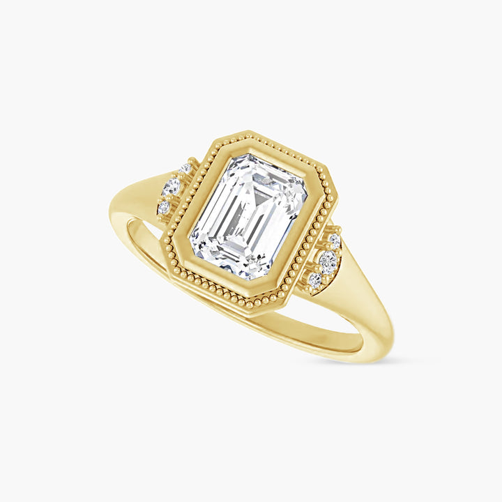 The Bezel-Set Tessa Emerald Yellow Gold