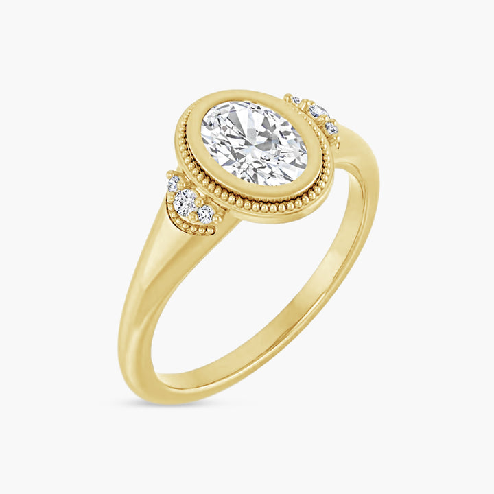 The Bezel-Set Tessa  Oval  Yellow Gold