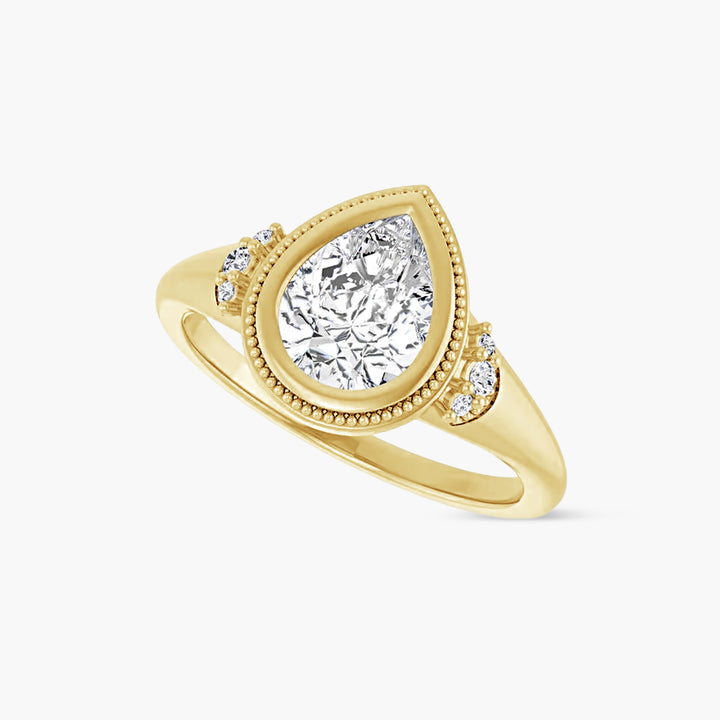 The Bezel-Set Tessa Pear Yellow Gold
