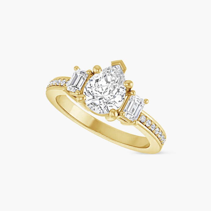 The Three Stone Amara  Pear Yellow Gold