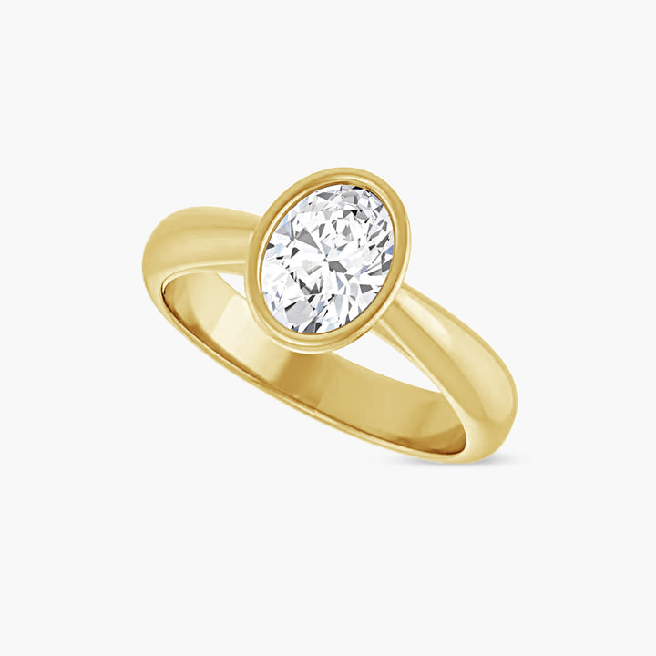The Bezel-Set Esmé  Oval Yellow Gold