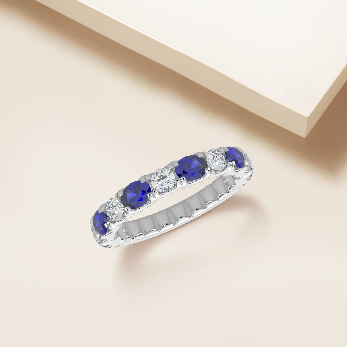 0.50 CTW Band In U-Prong Setting With Alternating Oval Sapphire